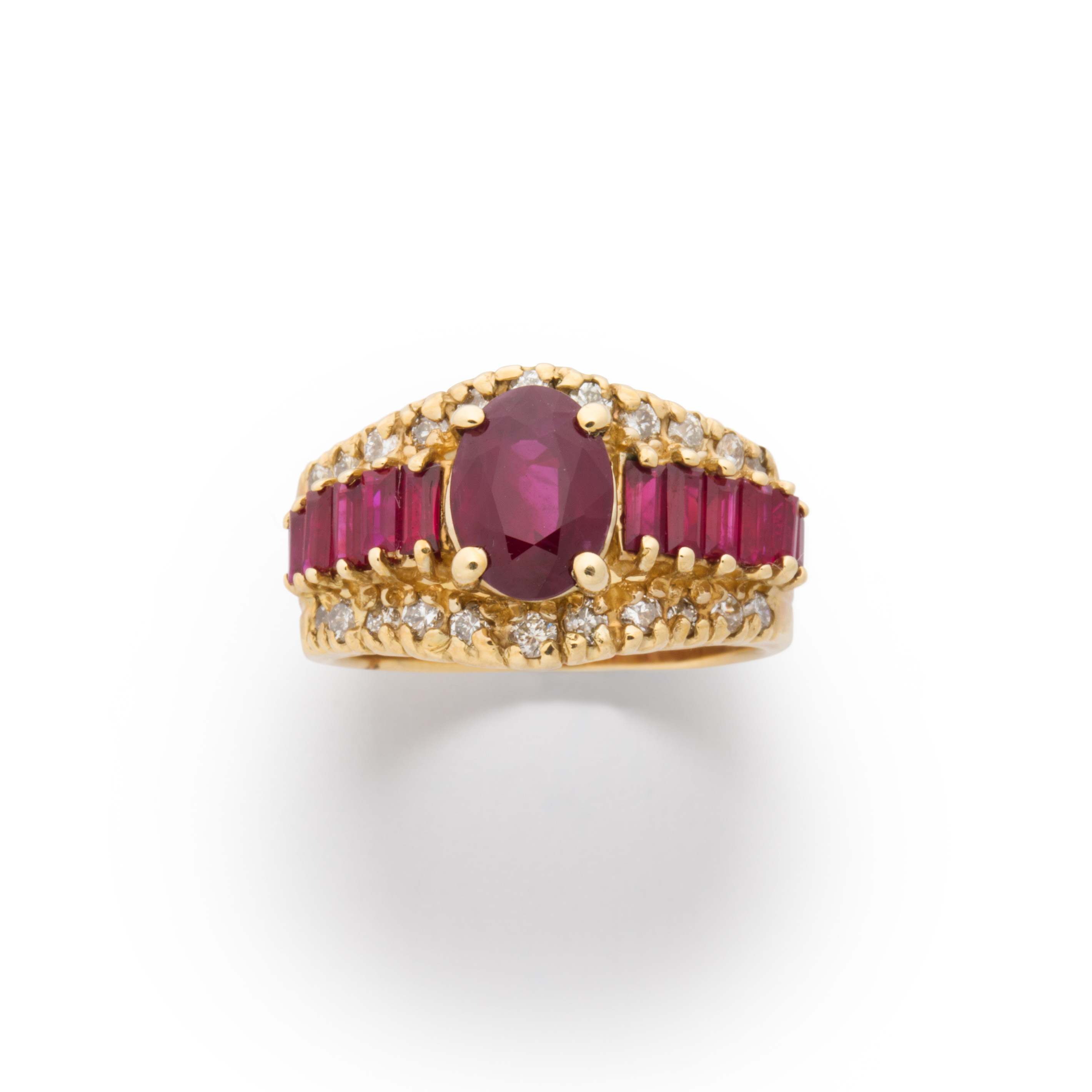 A RUBY, DIAMOND AND FOUTEEN KARAT