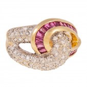 A RUBY & DIAMOND PAVE KNOT RIN