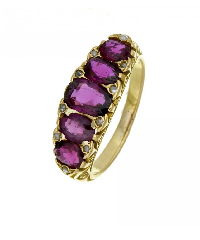 A RUBY FIVE STONE RING the rubies