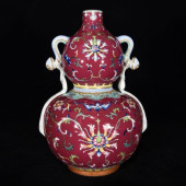 A RUBY-RED ENAMEL 'INTERLOCKIN