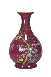 A RUBY-RED GLAZED AND GILT ENA