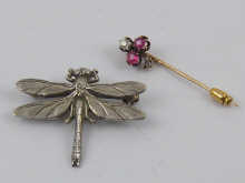 A Russian 14 carat gold stick pin