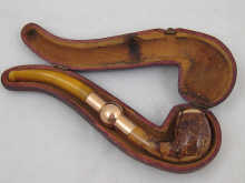 A Russian amber cheroot holder/