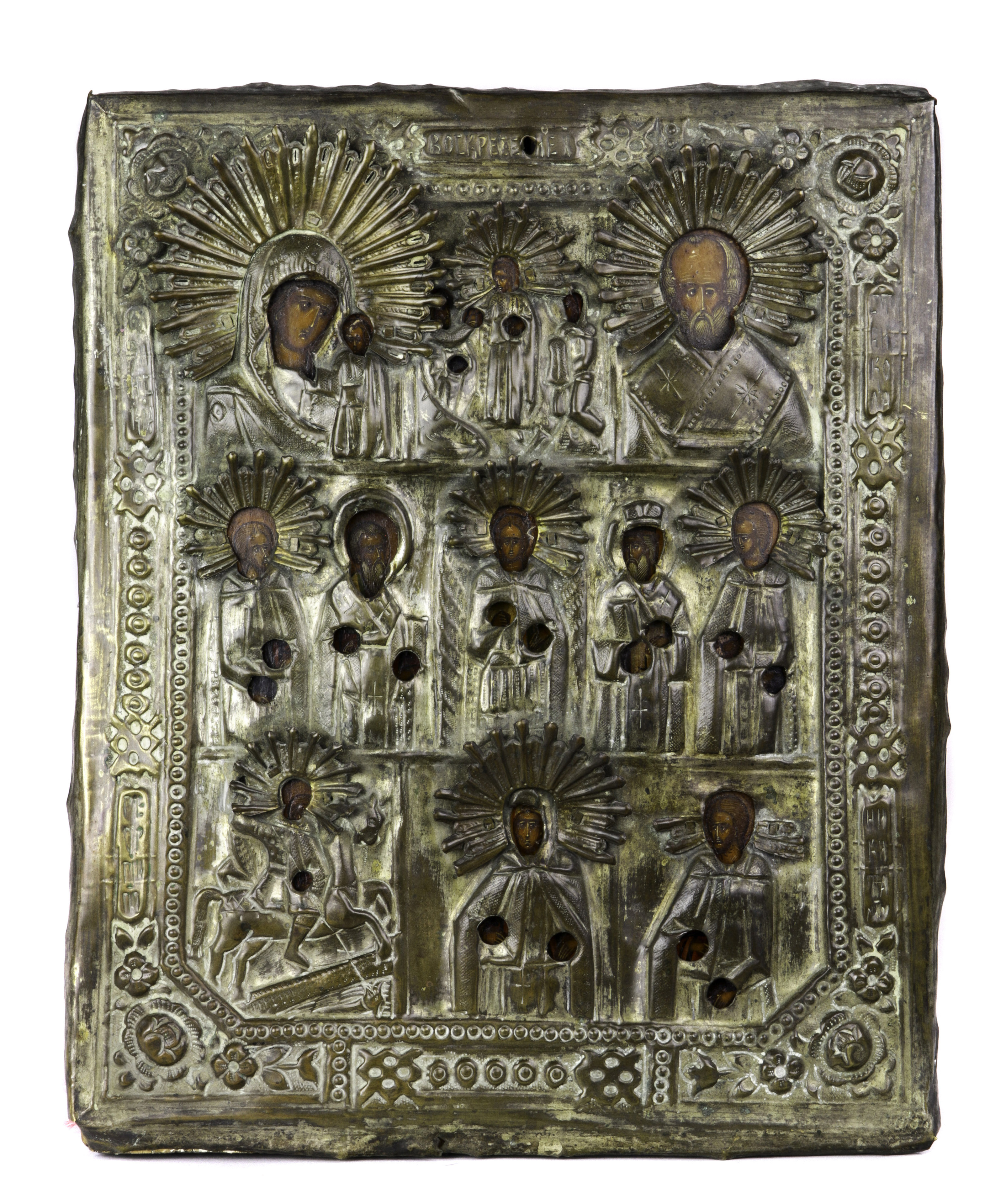 A RUSSIAN BRASS OKLAD FEAST ICON