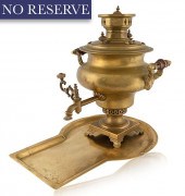 A RUSSIAN BRASS SAMOVAR AND TR