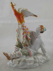 A Russian ceramic figure of a boy