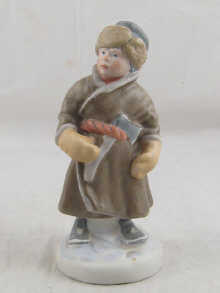 A Russian ceramic figure of a