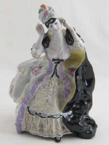 A Russian ceramic figure of a