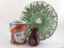 A Russian ceramic jug modelled as a