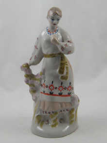A Russian Duleve porcelain figure