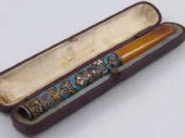 A Russian enamel on silver cig