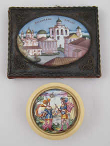 A Russian oval enamel plaque in a
