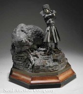 A Russian Patinated Bronze Scu