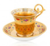 A RUSSIAN PORCELAIN CUP AND SA