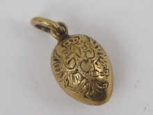 A Russian silver gilt miniature egg