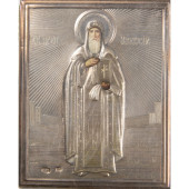 A RUSSIAN SILVER OKLAD ICON OF