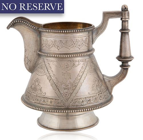 A RUSSIAN SILVER PITCHER,