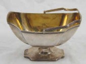 A Russian silver swing handle