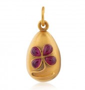 A RUSSIAN YELLOW GOLD AND RUBY