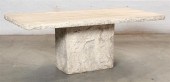 A RUSTIC CAST STONE DINING TAB