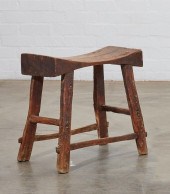 A RUSTIC MIXED WOOD STOOL, 20T