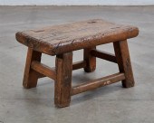 A RUSTIC MIXED WOOD STOOLA rus