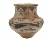 A SAN ILDEFONSO POTTERY VESSEL