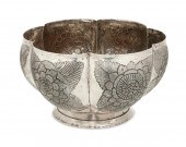 A SANBORNS STERLING SILVER BOW