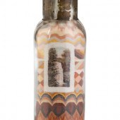 A Sand Art Bottle Featuring Mi