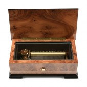 A SANKYO BURL WALNUT AND MARQU