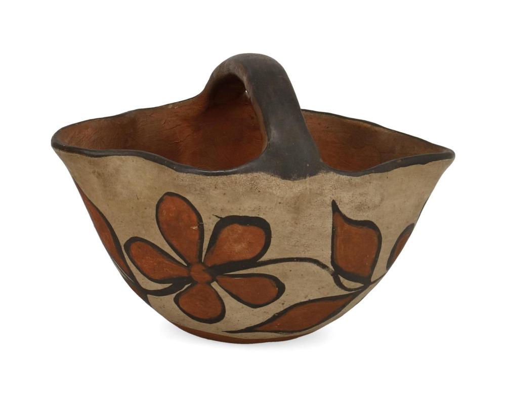 A SANTO DOMINGO PUEBLO POTTERY
