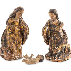A Santo Figural Group of the