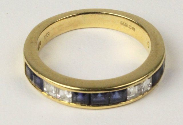 A sapphire and diamond half