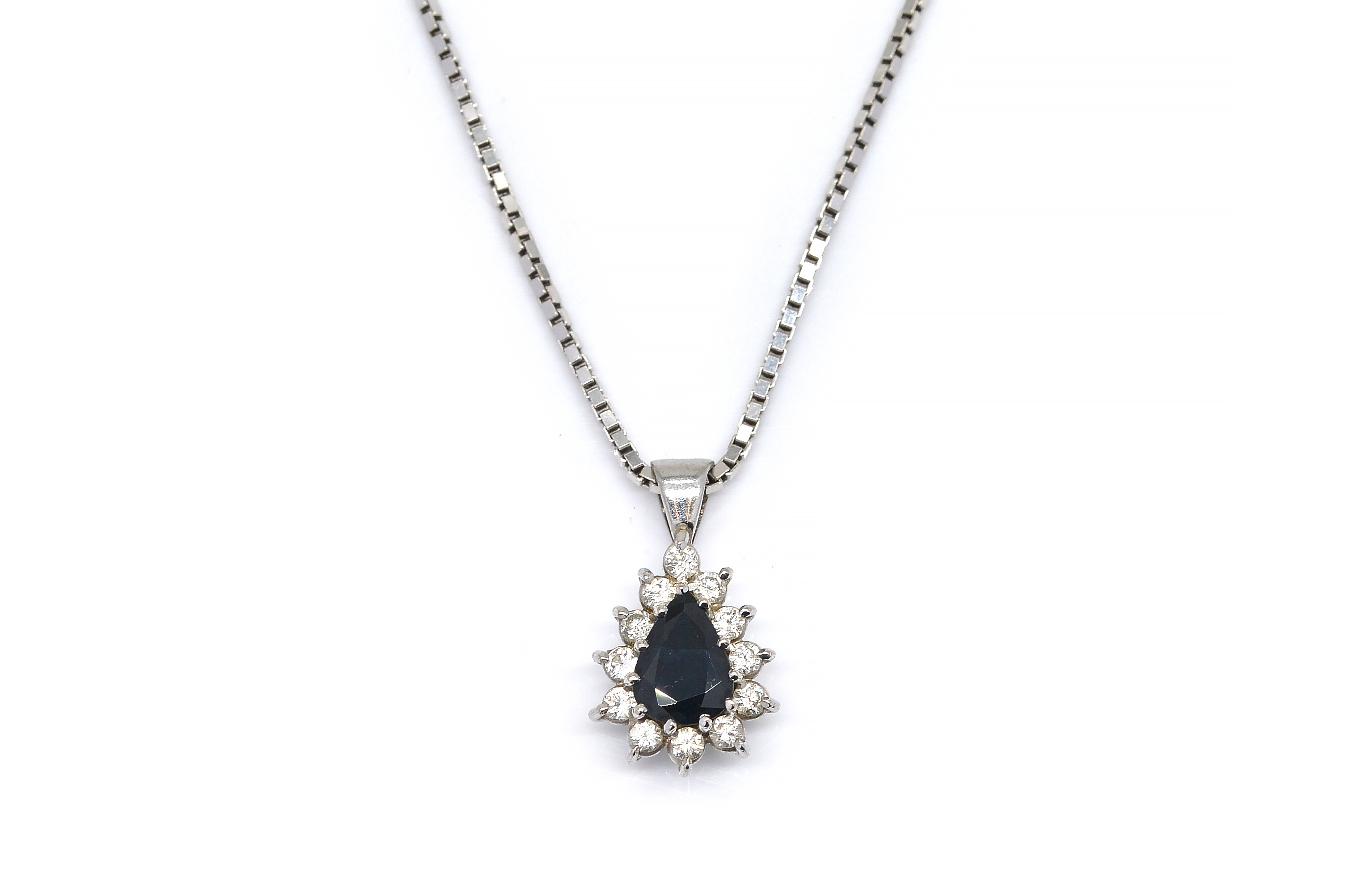 A SAPPHIRE AND DIAMOND PENDANT WITH