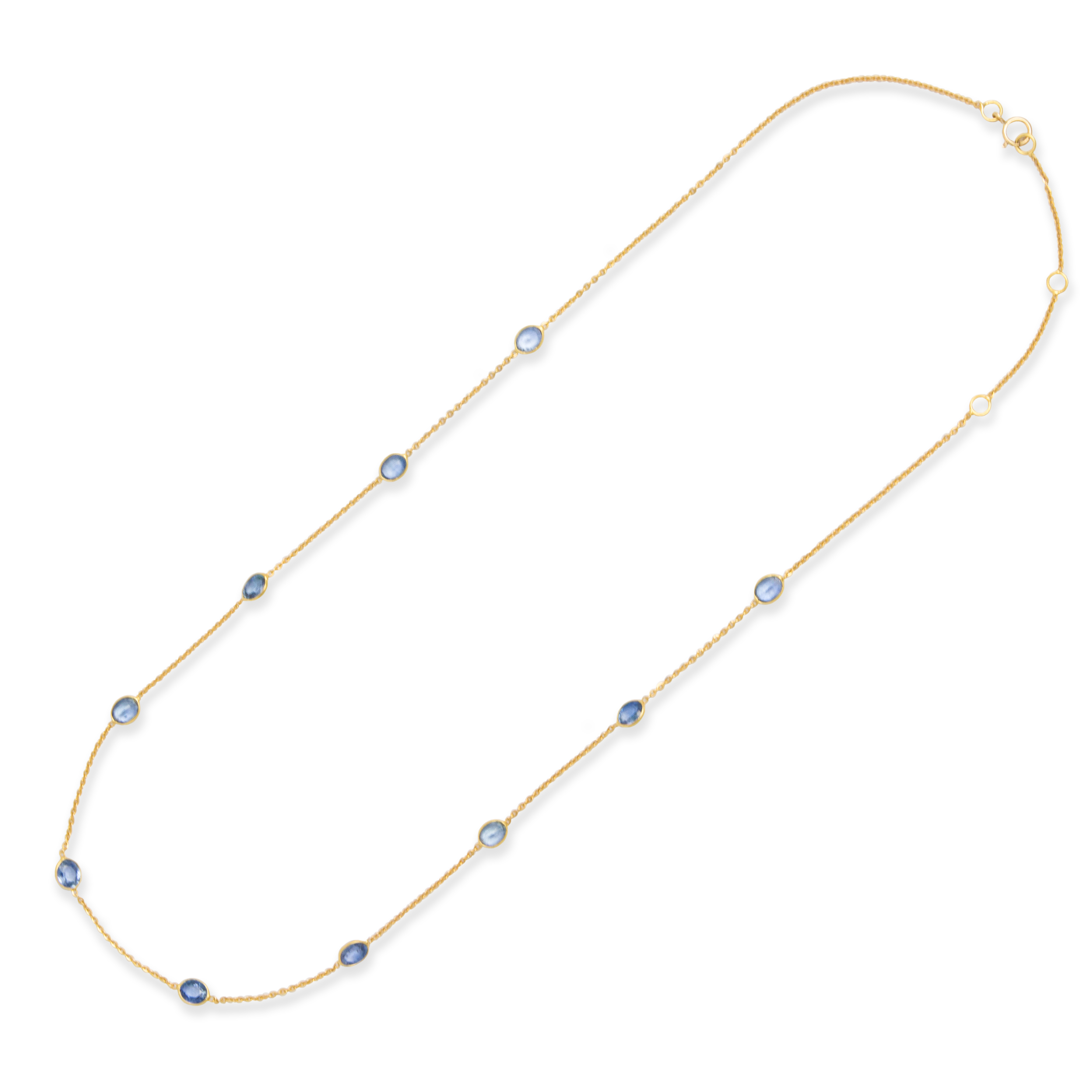 A SAPPHIRE AND EIGHTEEN KARAT