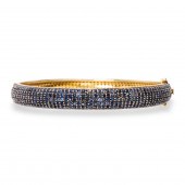 A SAPPHIRE BANGLE A sapphire b