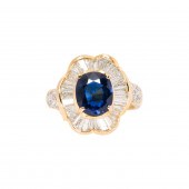 A SAPPHIRE, DIAMOND AND 18K GO