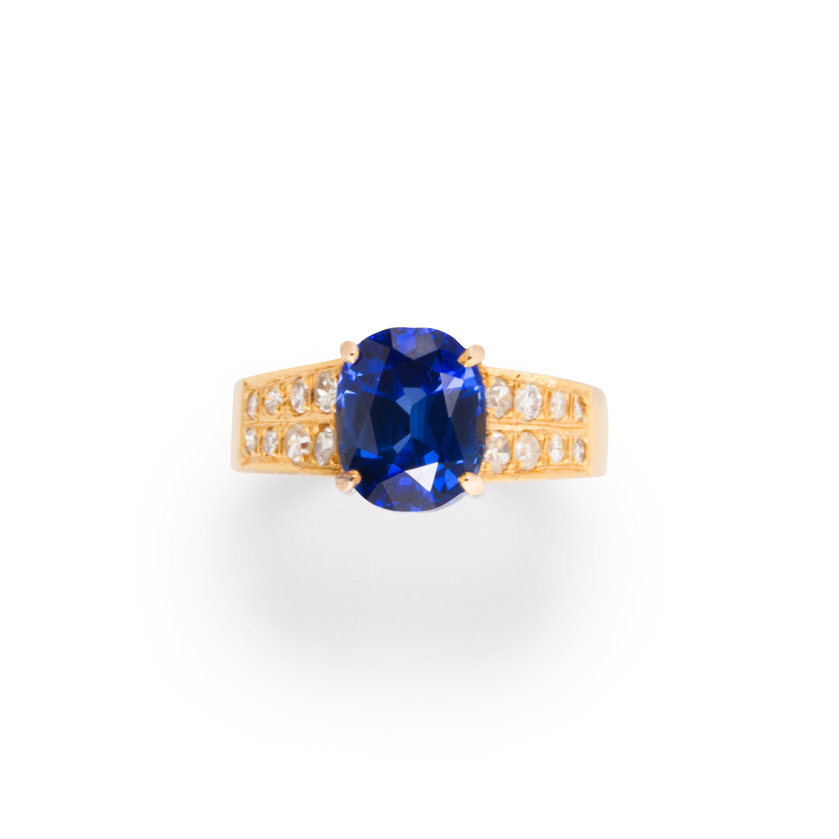 A SAPPHIRE, DIAMOND AND EIGHTEEN