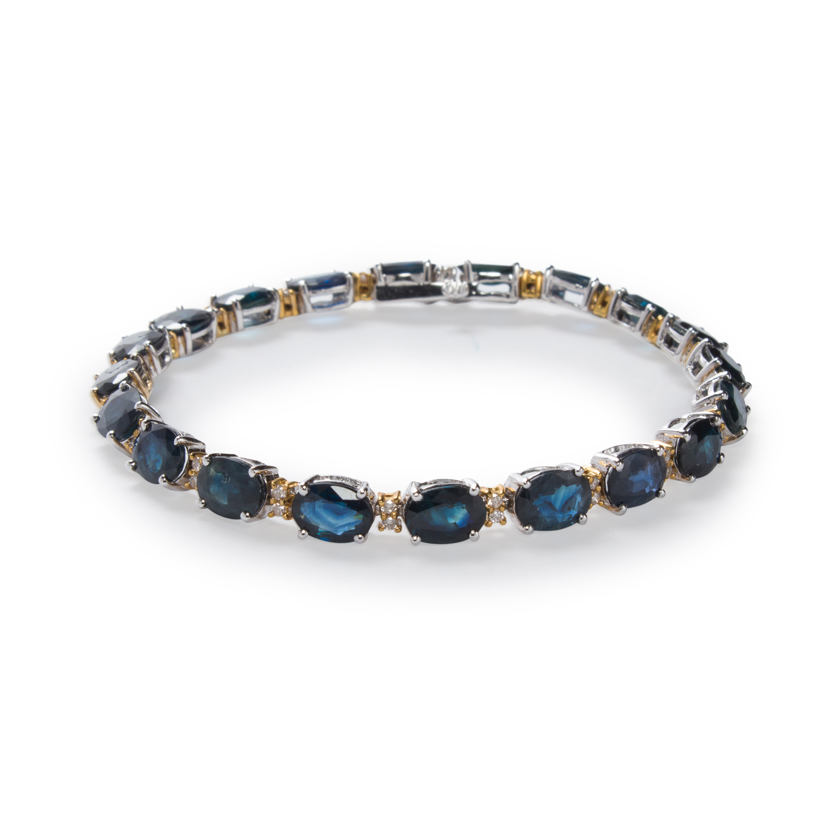 A SAPPHIRE, DIAMOND AND FOURTEEN