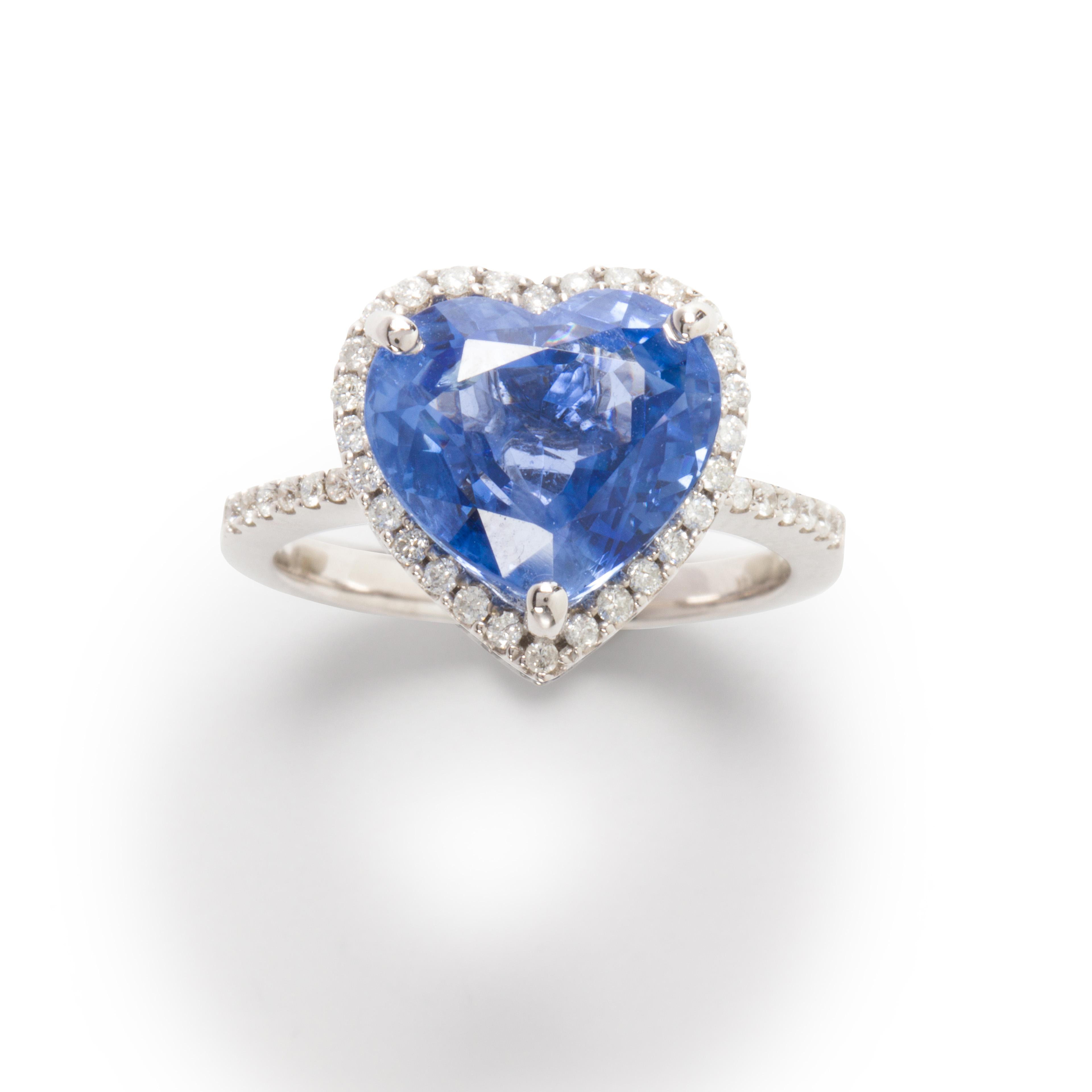A SAPPHIRE, DIAMOND AND FOURTEEN