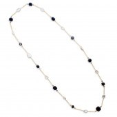 A SAPPHIRE, MOONSTONE AND DIAM