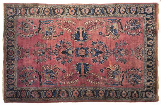 *A Sarouk Wool Rug having a