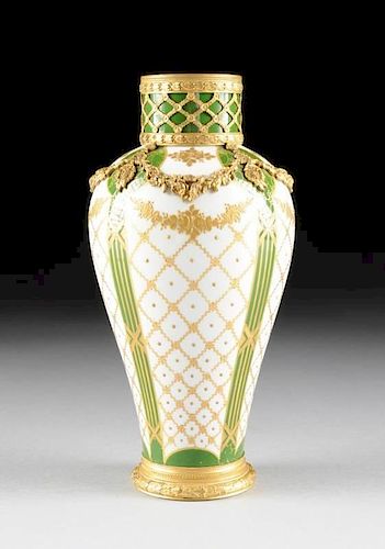 A SÃˆVRES STYLE GILT BRONZE MOUNTED