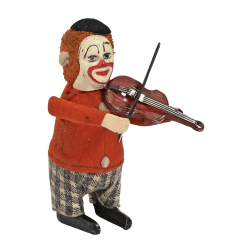 A Schuco clockwork tinplate and