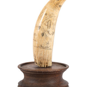 A Scrimshaw Whale's Tooth Mid