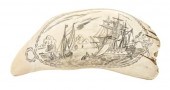 A Scrimshaw Whale's Tooth one