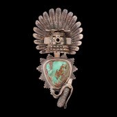 A SCULPTED KACHINA PENDANT SIG