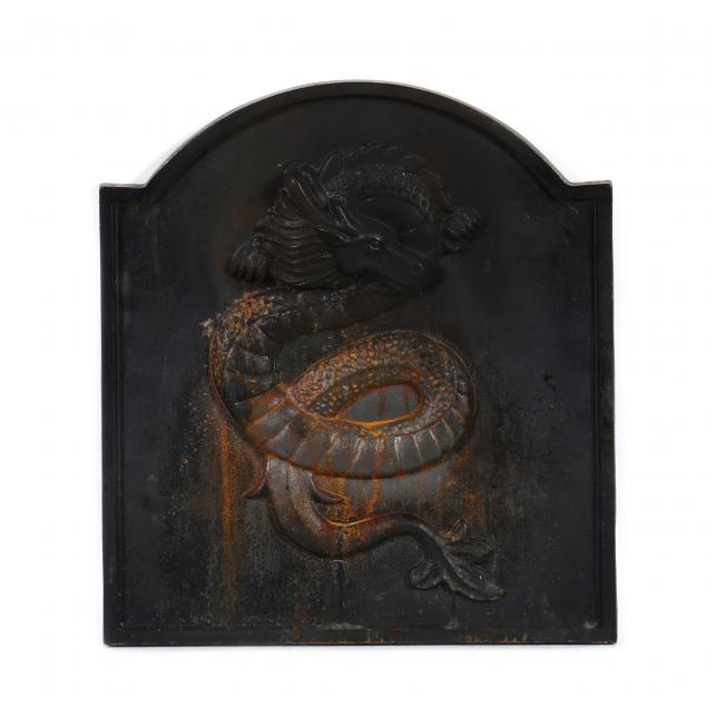 A SEA SERPENT FORM CAST IRON