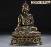 A SEATED BHAISAJYAGURU STATUE<