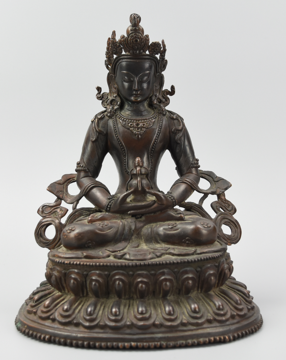 A SEATED BRONZE BUDDHA, DOUBLE